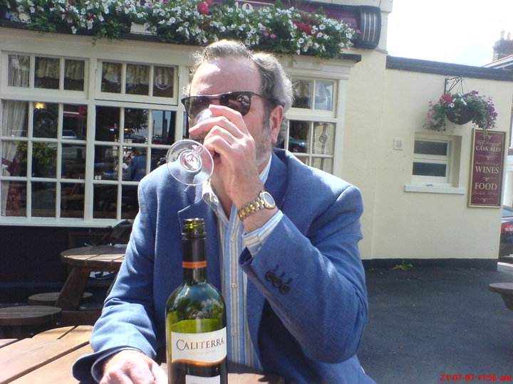 Nick Harris enjoying a glass of red wine